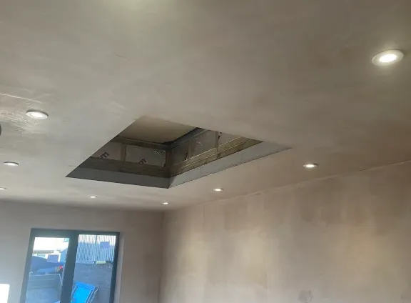 LED downlights fitted in a newly plastered ceiling around a roof lantern opening